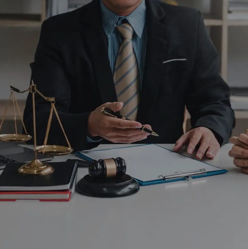 Client meeting with a DUI defence lawyer to discuss legal fees and the case