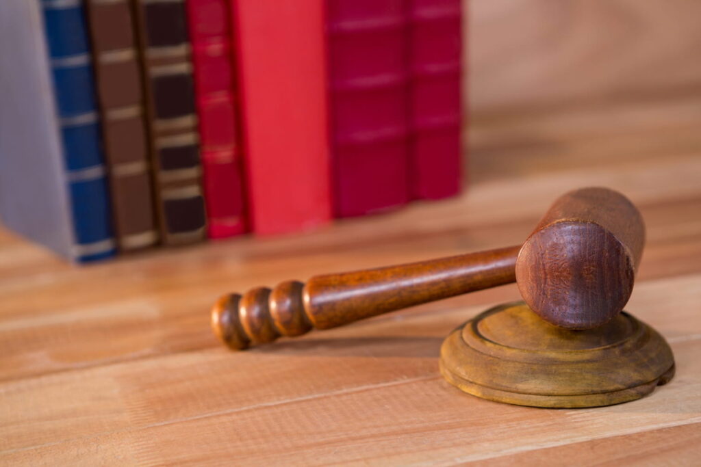 gavel in front of a book shelf
