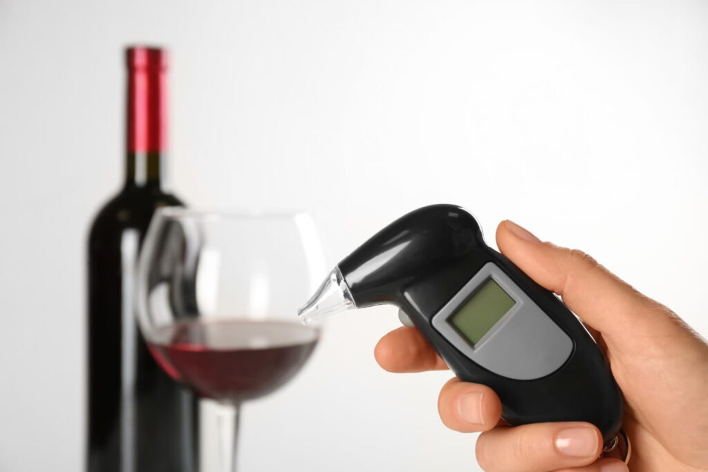breath test device and wine bottle