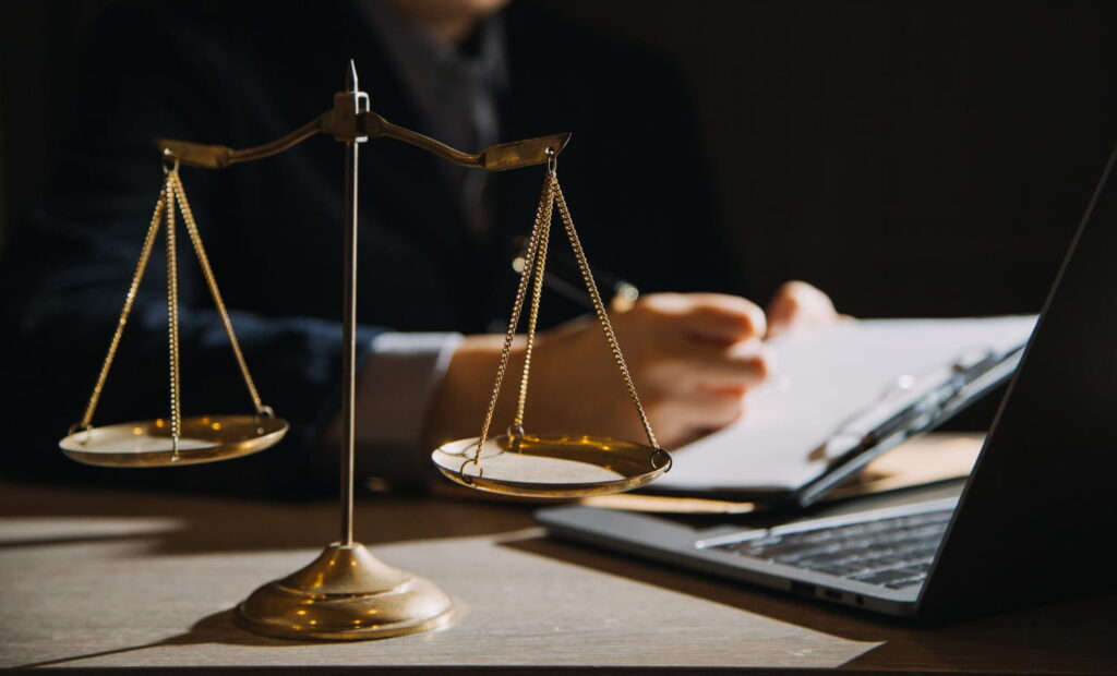 scales of justice on lawyer's desk